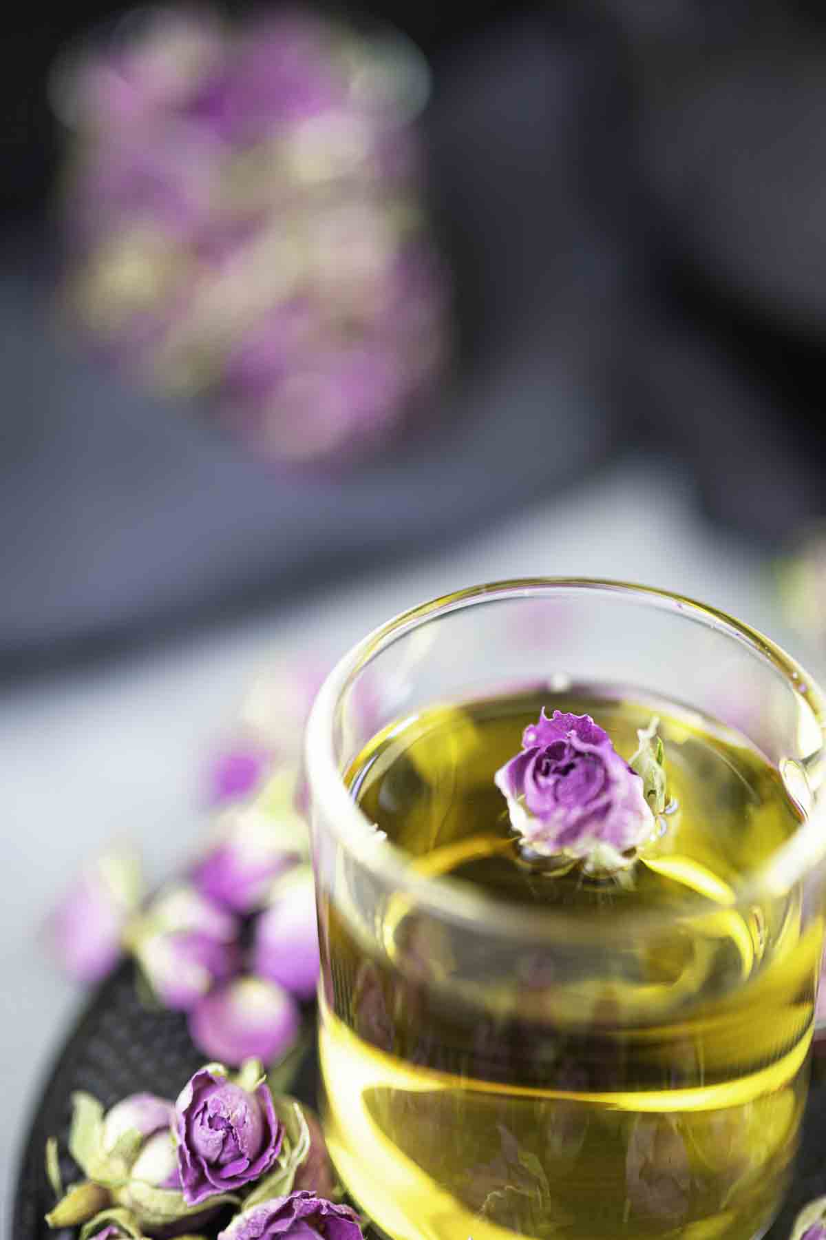 Rose tea with rose in.