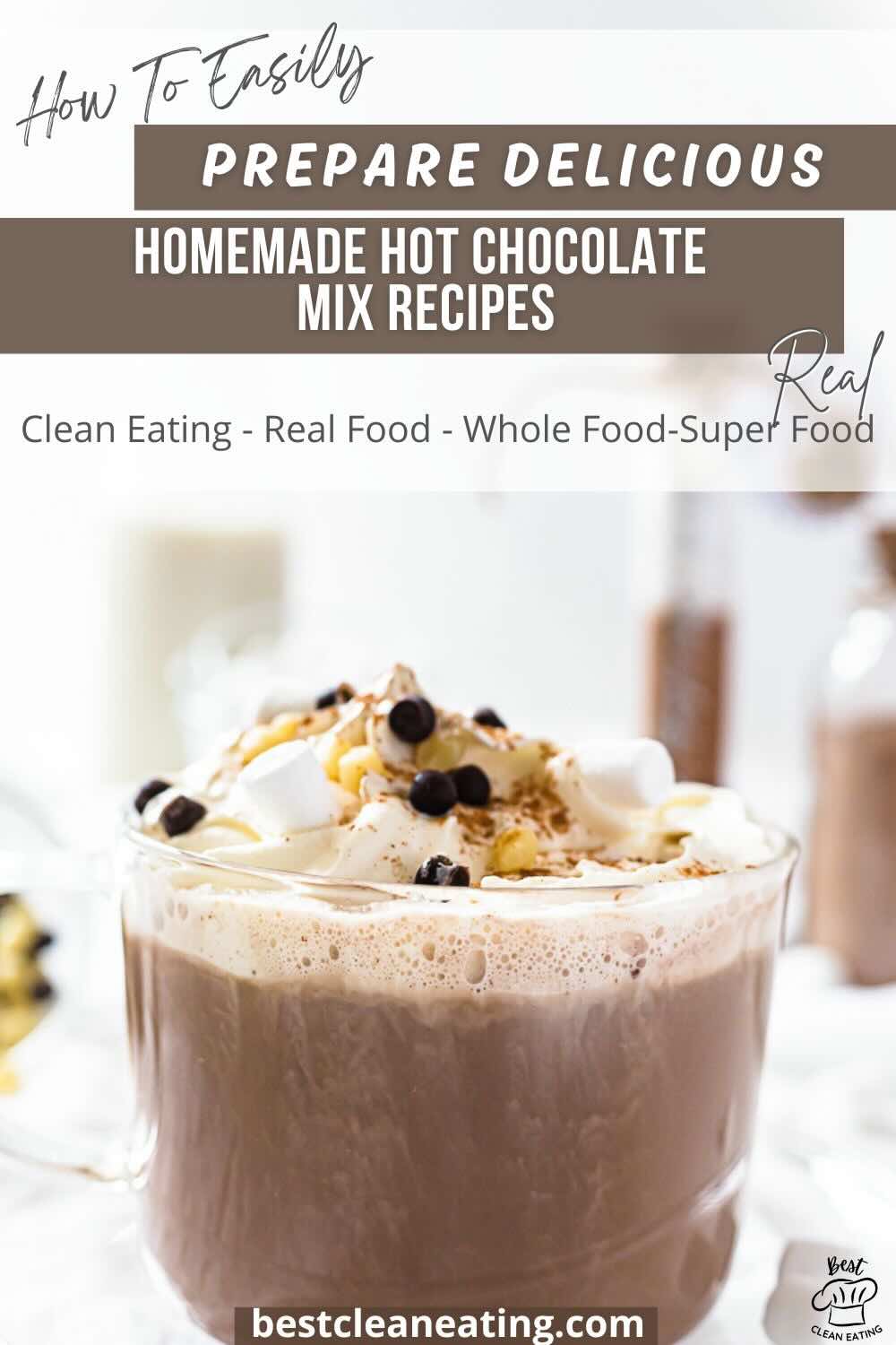 A mug of hot chocolate topped with whipped cream and chocolate chips, surrounded by blurred ingredients. Text overlay about homemade hot chocolate mix recipes.