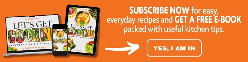 Orange banner showing a cookbook on print and digital devices, with text offering a free e-book for subscribing, and a "YES, I AM IN" button.