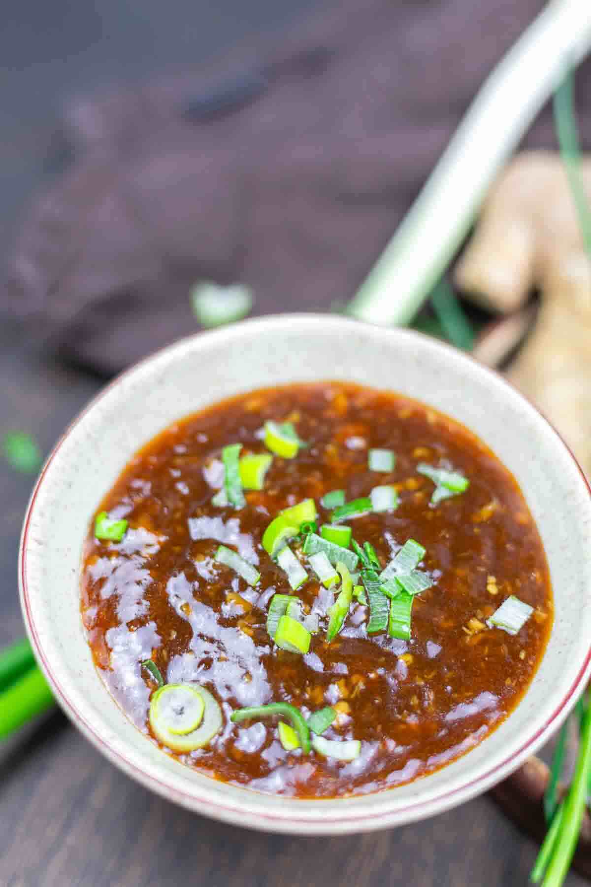 Spicy chilli garlic sauce topped with onions.