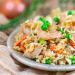Plate of shrimp and chicken fried rice.