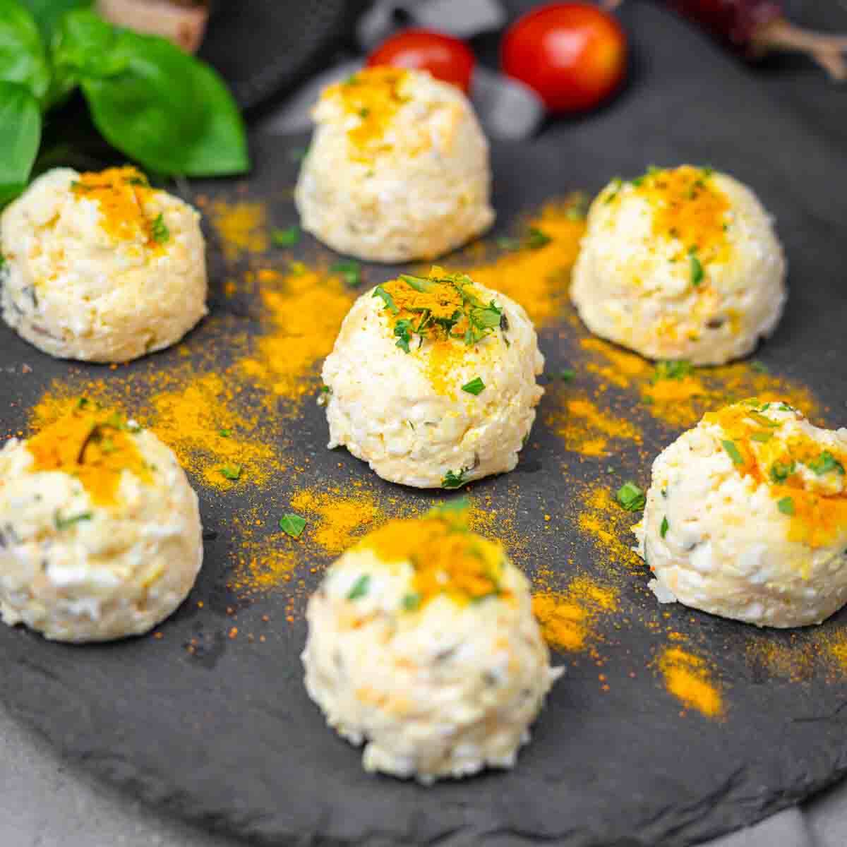 Plate of baked feta egg bites served.