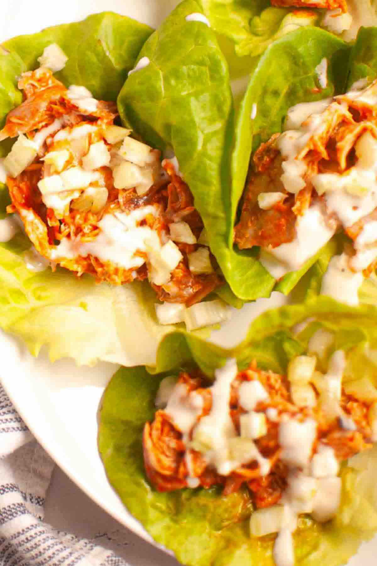 Close-up of buffalo chicken lettuce wraps.