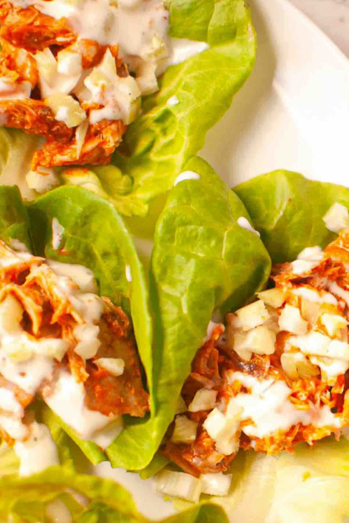 Fresh lettuce wraps filled with buffalo chicken.