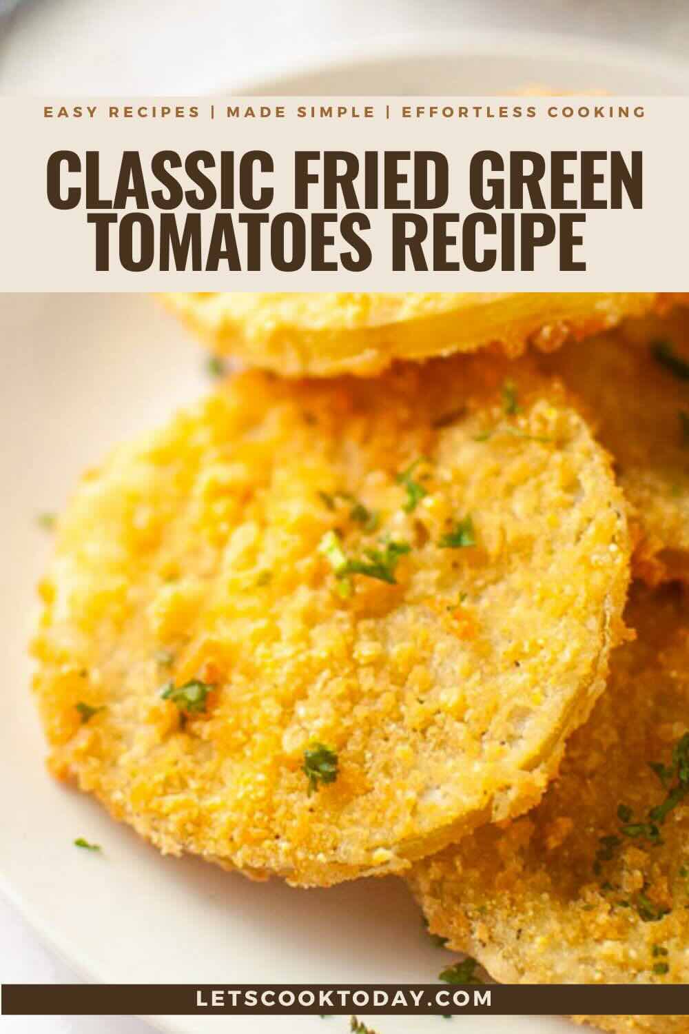 Close-up of crispy fried green tomato slices on a white plate, topped with chopped herbs; text overlay describes a classic fried green tomatoes recipe.