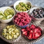 Mixed dried fruits and vegetables on tray.