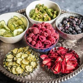 Mixed dried fruits and vegetables on tray.