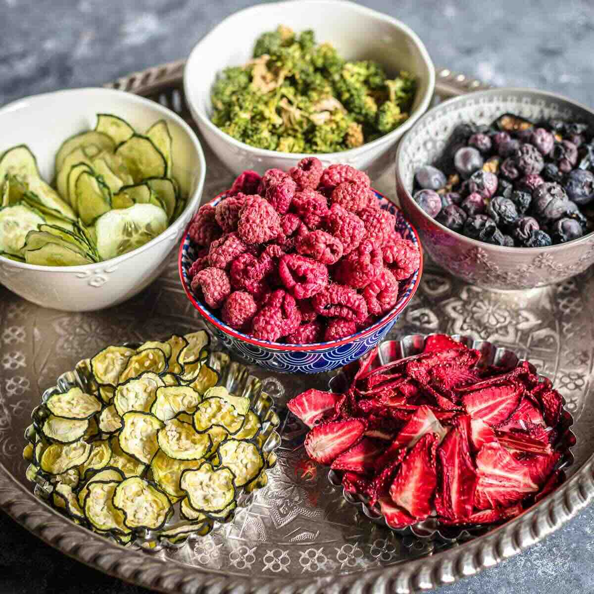Mixed dried fruits and vegetables on tray.