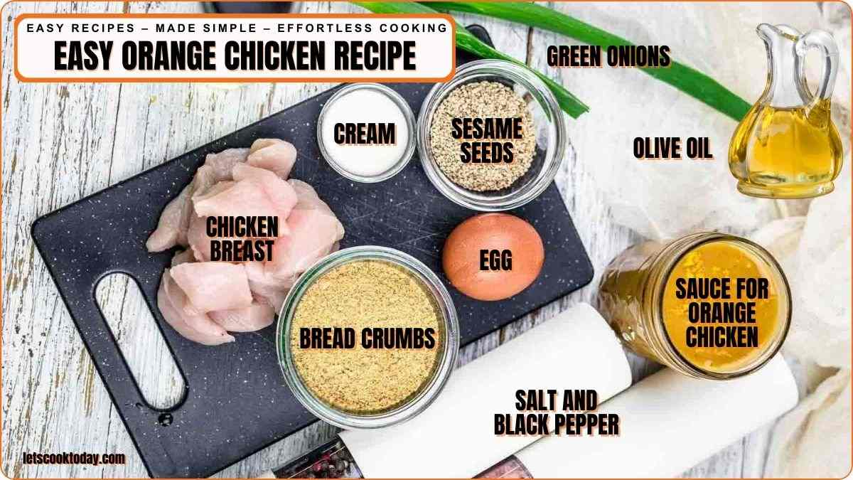 Ingredients for orange chicken arranged on black board.