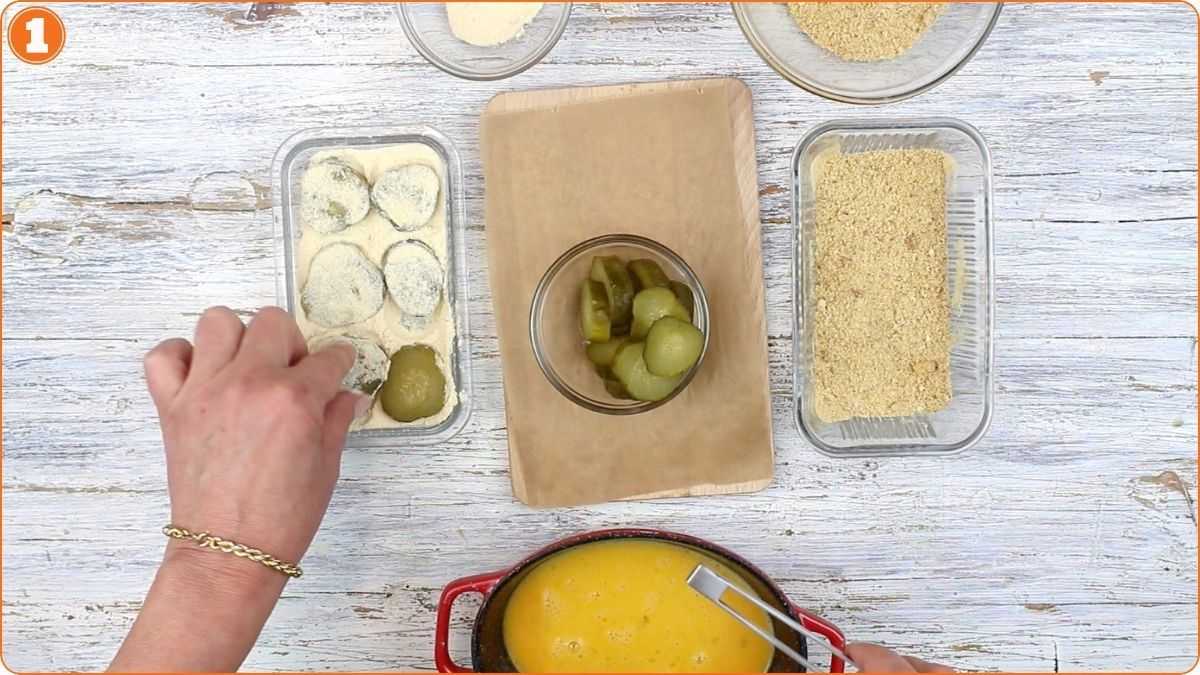 A person putting food into a bowl.