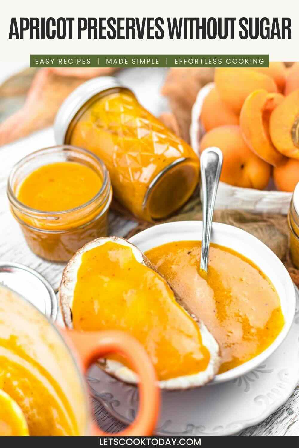 Jars of apricot preserves without sugar, a bowl of preserves with a spoon, fresh apricots, and toast topped with the preserves on a white plate.