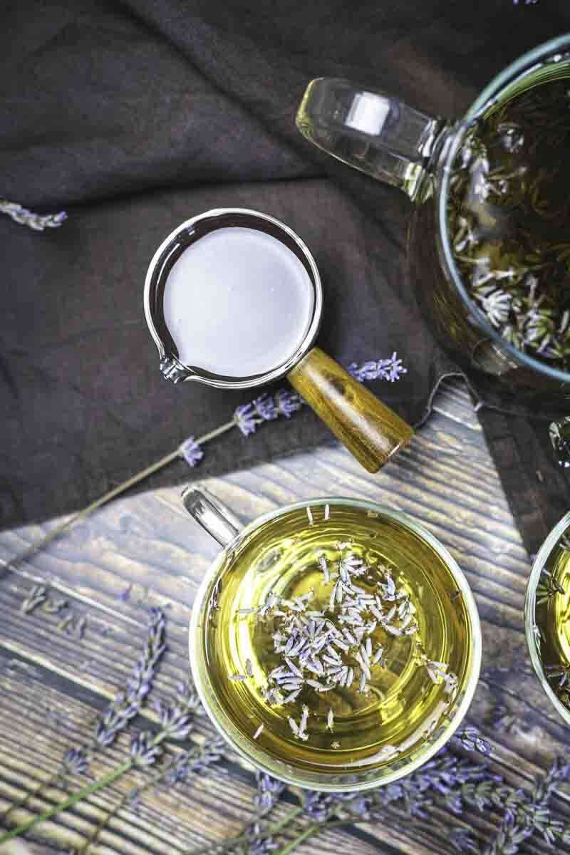 Overhead view of lavender tea and milk.