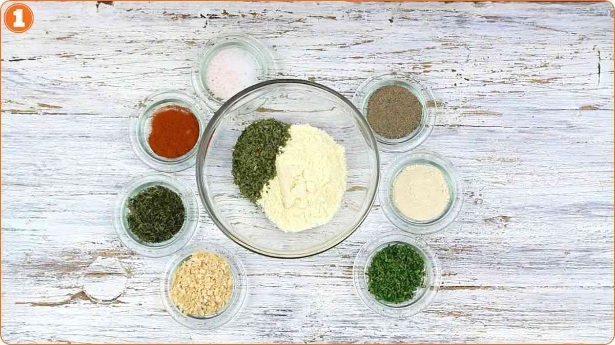 Buttermilk powder and dried herbs in bowl.