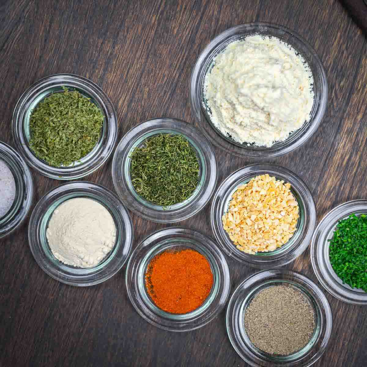 Assorted spices for homemade ranch seasoning.