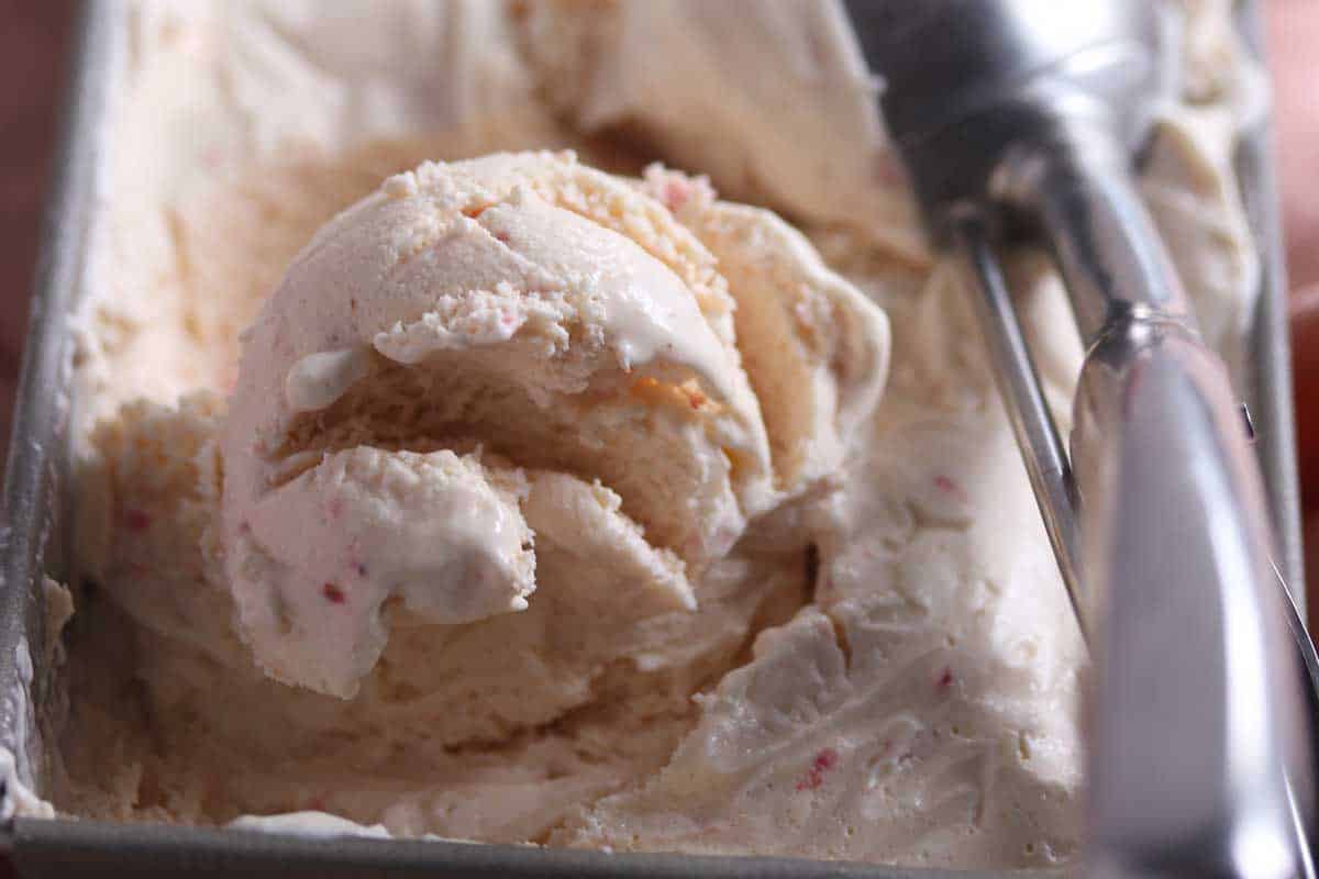 Close view of creamy strawberry ice cream.