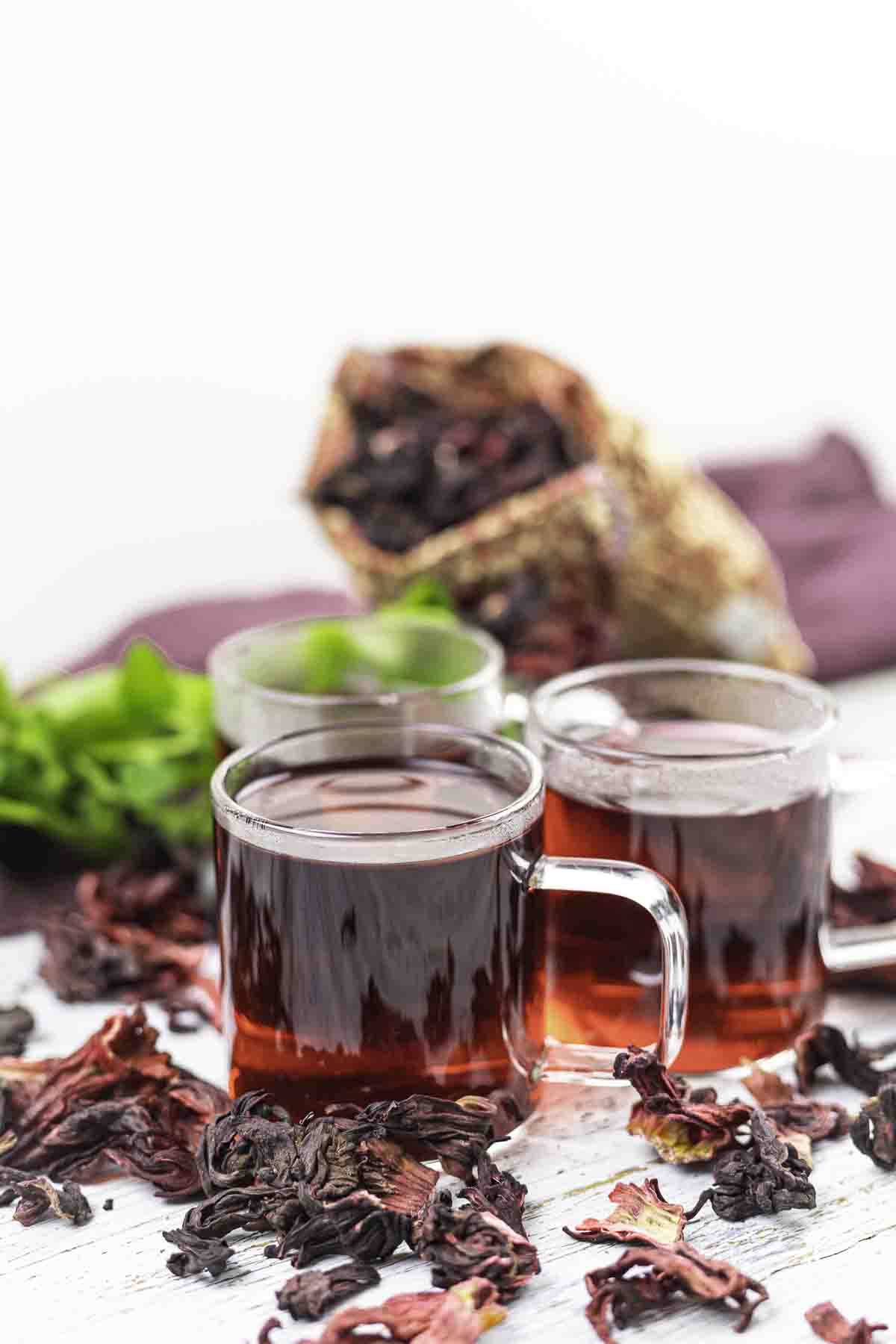 Hot sorrel tea with dried hibiscus petals.