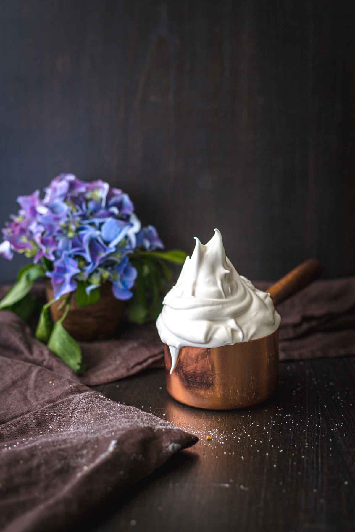 Whipped meringue icing with flowers.