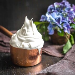 Thick meringue icing piled high in pot.