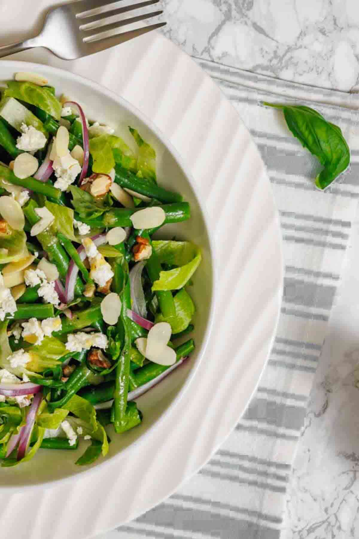 Green bean salad with almonds and onions.