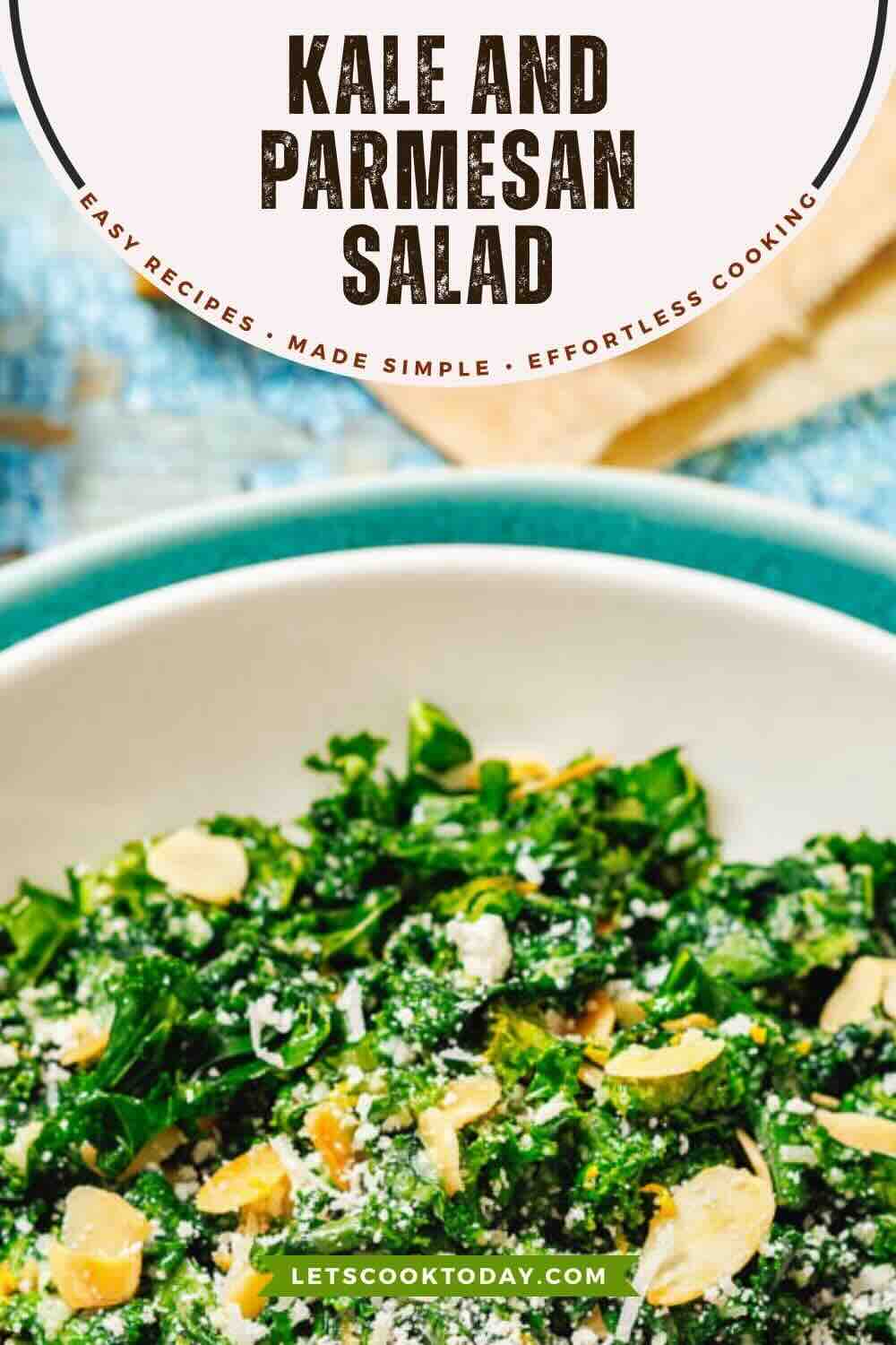 Kale and parmesan salad in white bowl.