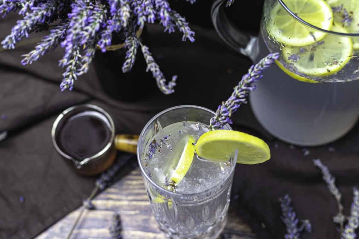 Overhead view of lavender mocktail and pitcher.