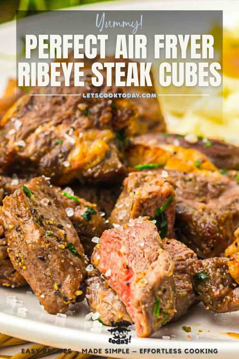 Air fryer ribeye steak cubes with seasoning.