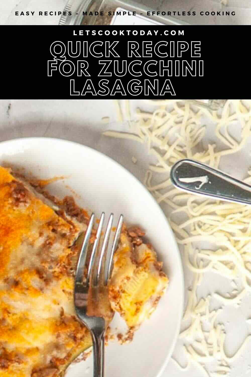 Zucchini lasagna slice on white plate with fork.