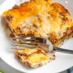 Zucchini lasagna slice with melted cheese layers.
