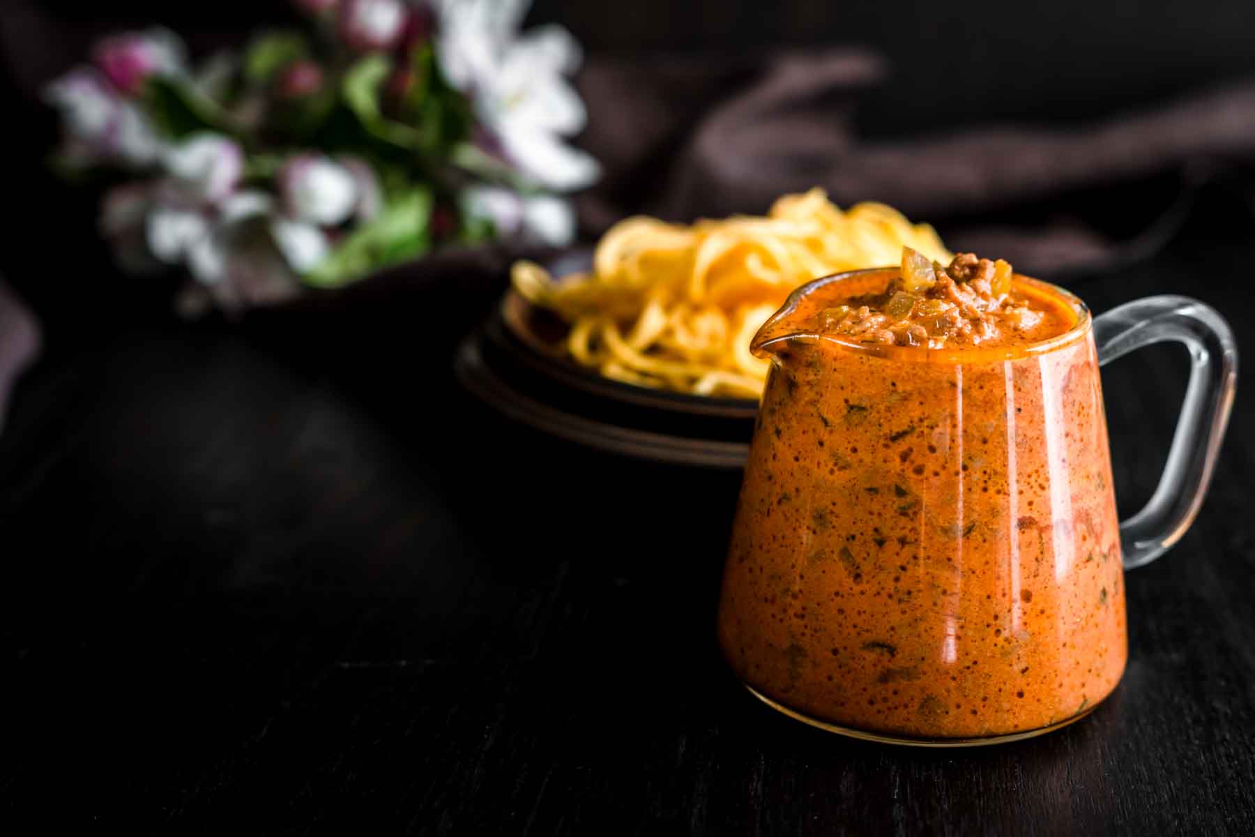 Creamy spaghetti meat sauce served with pasta.