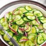 Tangy cucumber salad with herbs and onion.