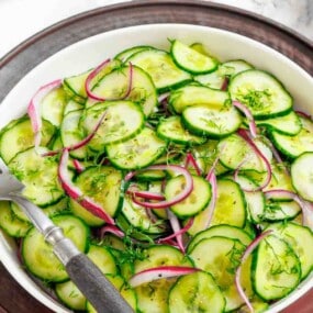 Tangy cucumber salad with herbs and onion.