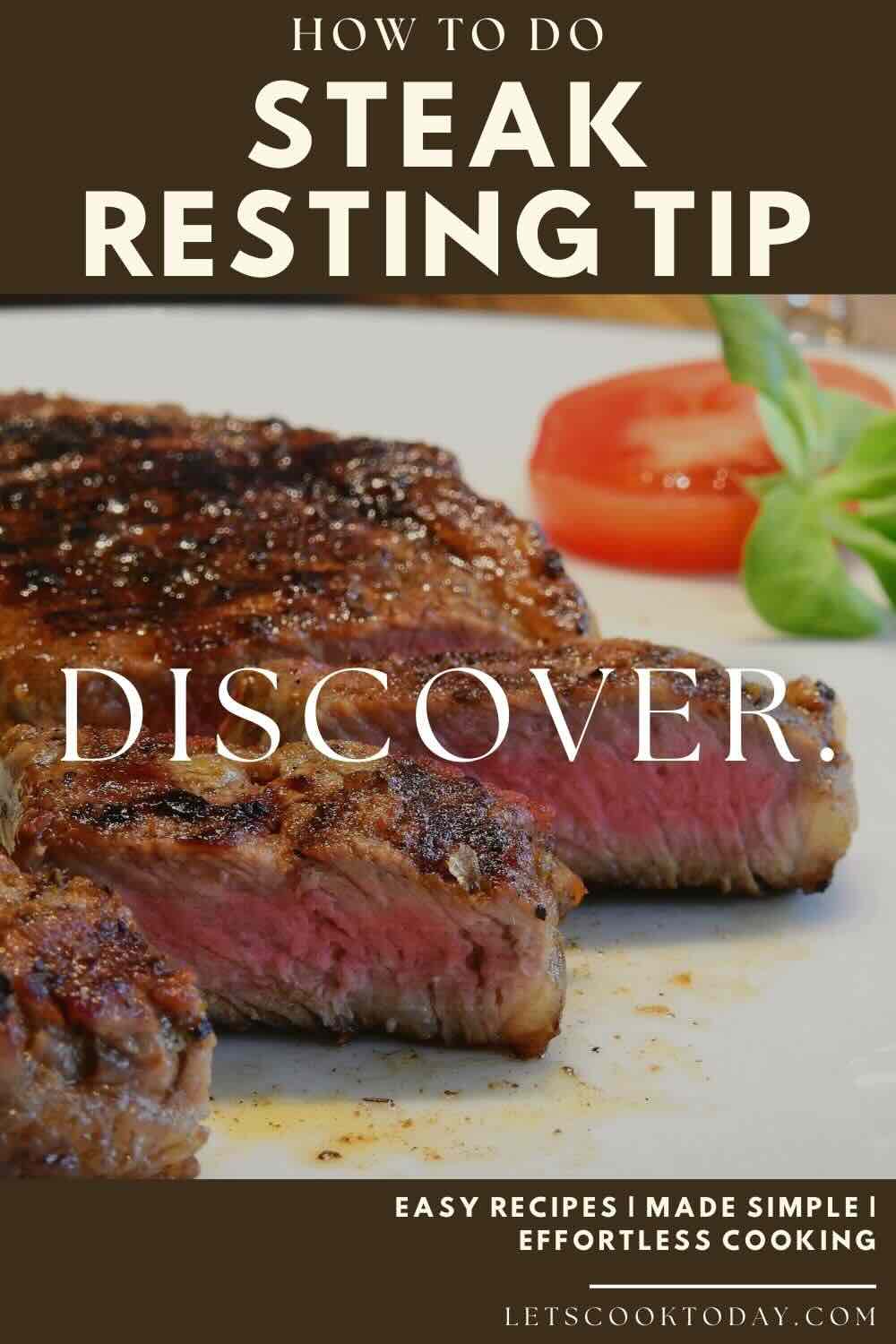 Juicy sliced steak resting beside tomato garnish.